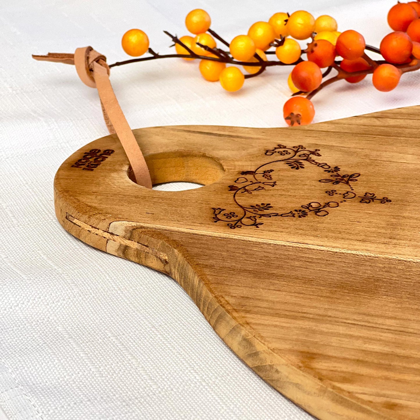 Graviertes Schneide-/Servierbrett aus Holz - Rund
